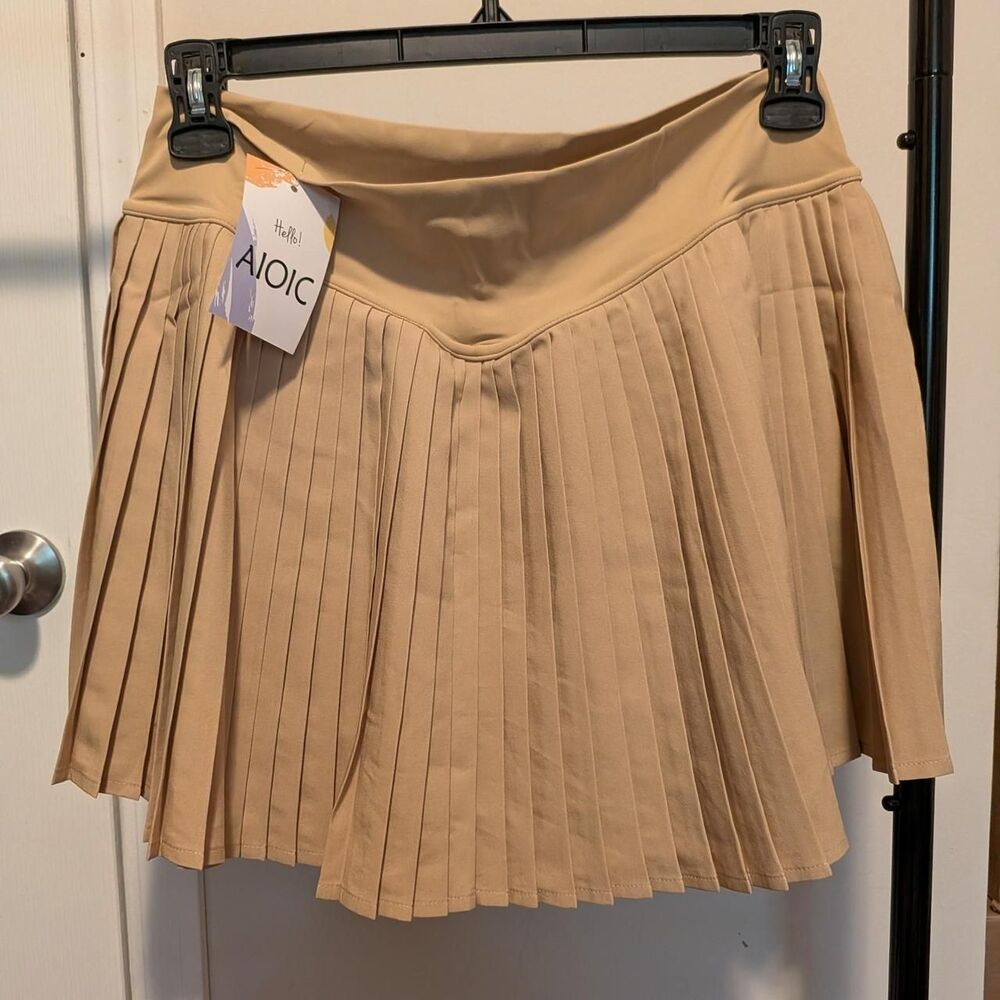 AIOIC tan pleated mini skirt with built in shorts